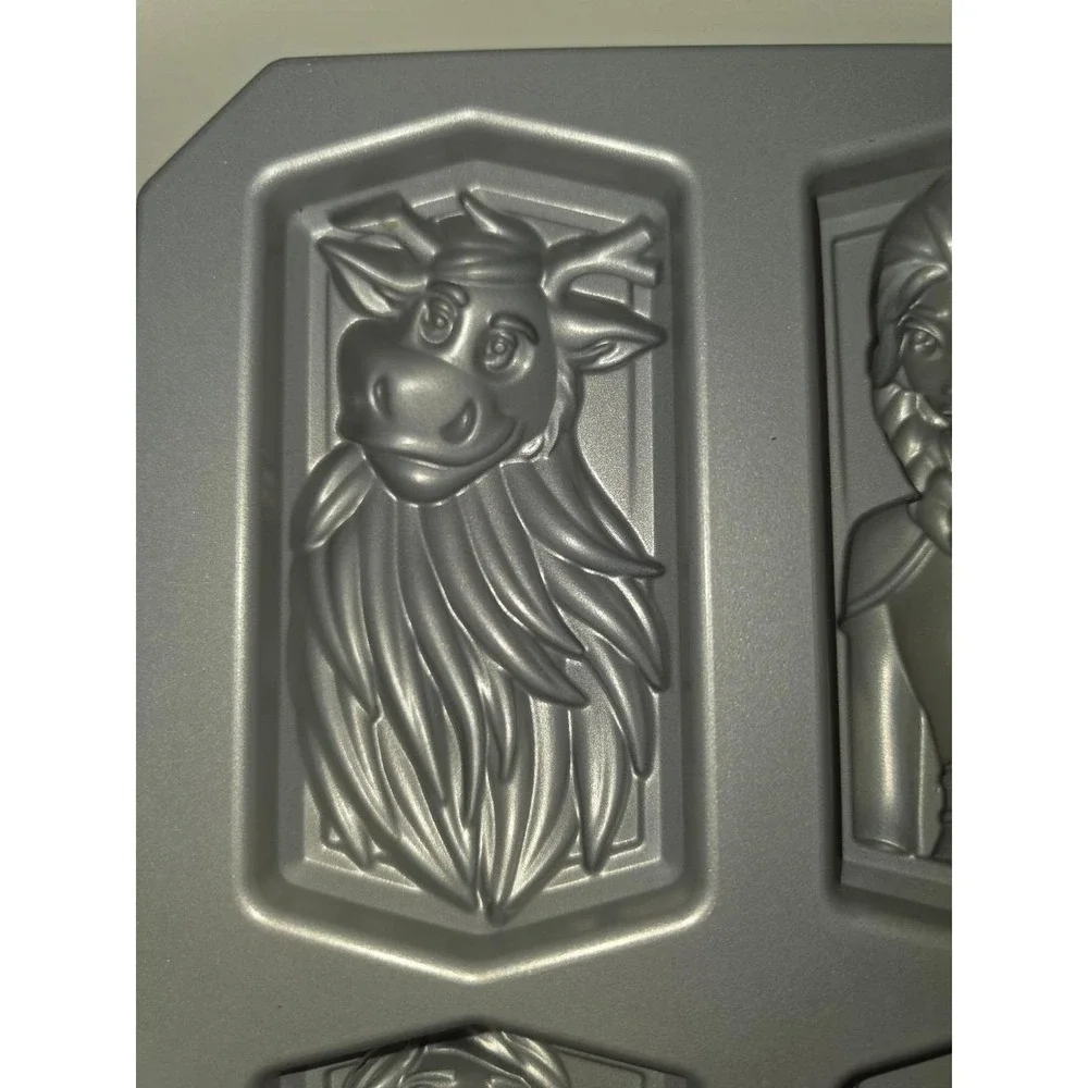 Nordic Ware Disney Frozen 2 character cakelet pan is made of heavy cast aluminum